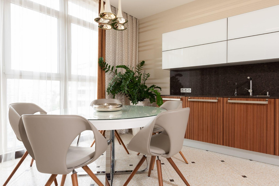 Dining set in kitchen with tile flooring